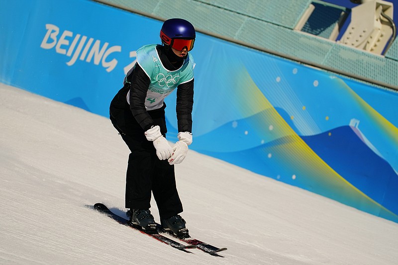 Eileen Gu, of China, trains ahead of the women's freestyle skiing big air finals of the 2022 Winter Olympics, Tuesday, Feb. 8, 2022, in Beijing. (AP Photo/Matt Slocum)
