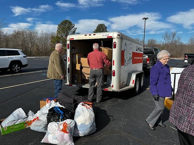 Presbyterian Church of Bella Vista member John Jaeger led a clothing drive for the people of Louisville and Superior, Colo., who lost their homes and possessions in the recent fires there. Jaeger and his neighbor delivered the trailerload of gently used clothing on Feb. 8. Pictured in the photo from left to right are PCBV elders Mack Bean and Jim Watson and Deacon Jan Halgrim.

(Courtesy photo)