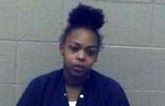 Woman charged in Jan. 8 shooting