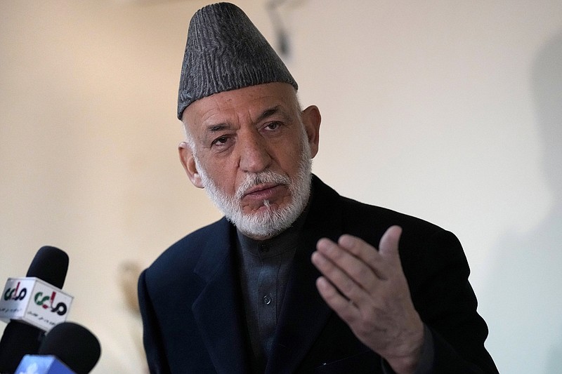 Former Afghanistan's President Hamid Karzai speaks during a press conference, in Kabul, Afghanistan, Sunday, Feb. 13, 2022. Karzai called a White House order freeing $3.5 billion in Afghan assets for America's 9/11 families &quot;an atrocity against the Afghan people.&quot; He also sought the help of Americans, and in particular the families of the thousands killed on 9/11, to press the White House to rescind last week's order which he said was both &quot;unjust and unfair.&quot; (AP Photo/Hussein Malla)