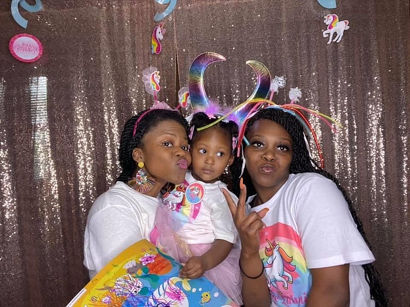 Kanesha Barnes-Adams (left) poses with her niece Kelahni White and sister Kadazha Barnes. Barnes died Feb. 7, 2021, in a fatal car accident. (Special to the Commercial)