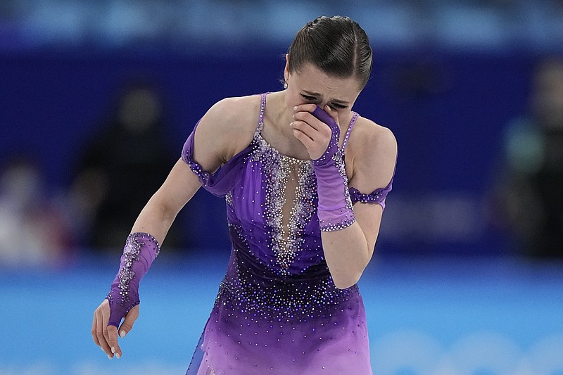 Embattled Olympic skater Valieva leads after short program