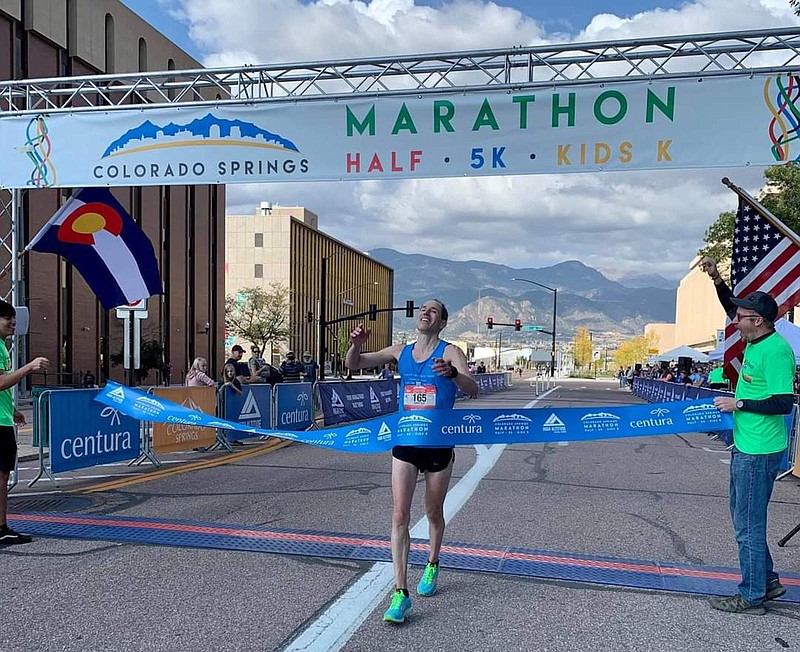 Spa Pacers President Jerry White crosses the finish line at the Colorado Springs Marathon. - Submitted photo