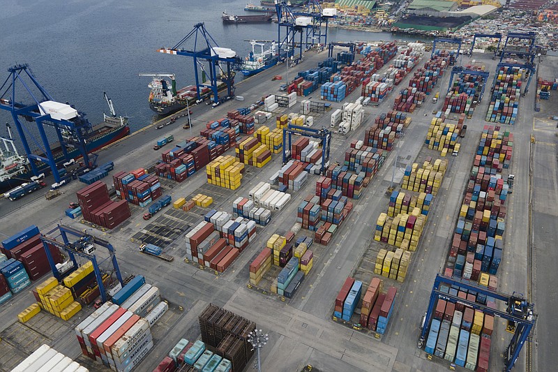 FILE - Stacks of containers line the Manila North Harbour Port, Inc. in Manila, Philippines on Tuesday Oct. 19, 2021. The Philippines on Thursday, Feb. 17, 2022, joined New Zealand in its decision to reject Myanmar under the world’s largest free trade pact that took effect this year after the military's seizure of power in 2021 sparked deadly violence and democratic setbacks. (AP Photo/Aaron Favila, File)