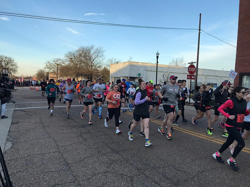 Some 465 runners participated in Sunday's 14th Annual Run the Line Half Marathon. The yearly fundraiser supports local recreational  jogging trail maintenance. (Staff Photo By Greg Bischof)