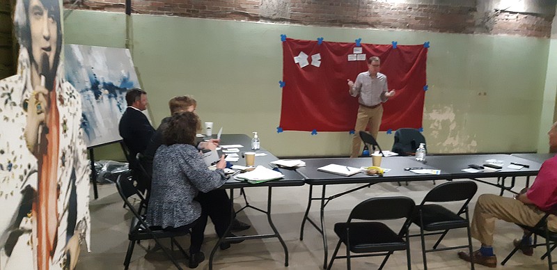 Randy Wilson, a consultant who works with Main Street organizations, helps Main Street Texarkana members brainstorm plans for downtown development Tuesday at the Municipal Auditorium in Texarkana, Arkansas. (Staff photo by Junius Stone)
