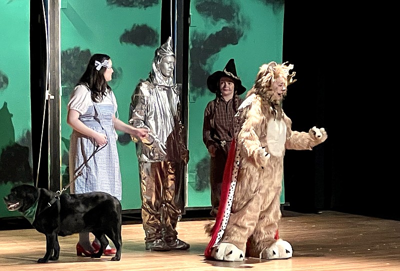 Submitted
Madeleine Cerneka, as Dorothy, Noah Cerneka, as Tinman, and Rhian Austin, as Scarecrow, meet Mariah Nichols, as the Cowardly Lion, at Fulton High School's production of "Wizard of Oz" on Saturday.