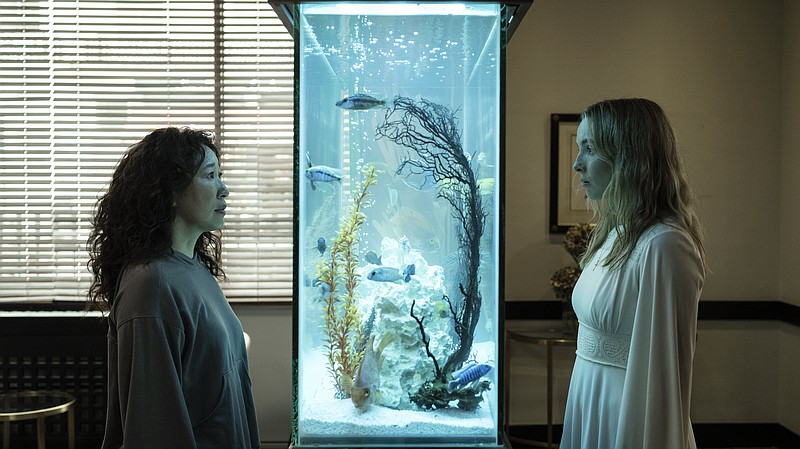 Sandra Oh plays Eve (left) and Jodie Comer is Villanelle in a scene from the final season of “Killing Eve,” on BBC America and the AMC+ streaming service. (BBC America via AP/Anika Molnar)