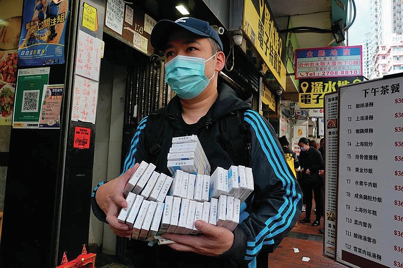 Hong Kong covid cases hit day record of 34,446