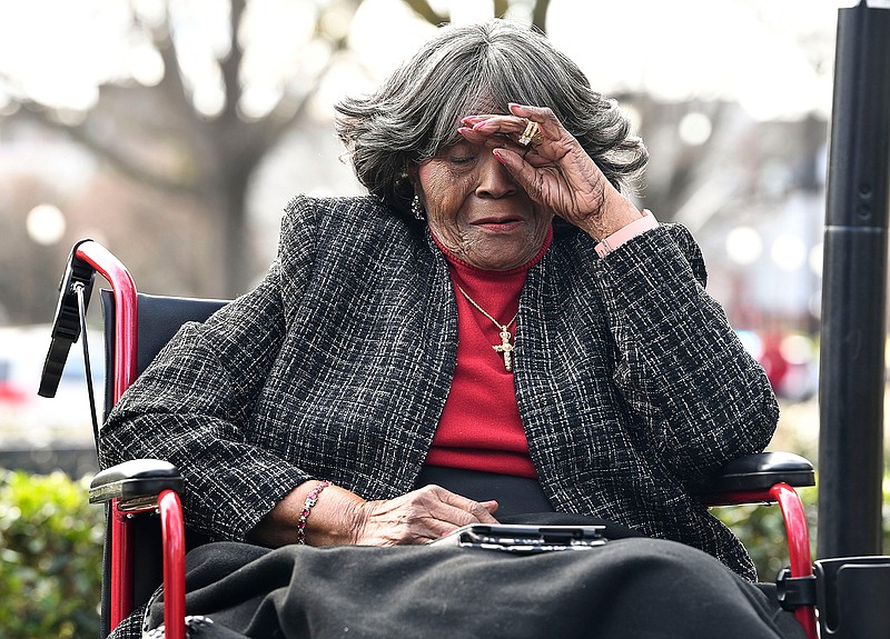 FILE - Autherine Lucy Foster reacts during the dedication ceremony for Autherine Lucy Foster Hall in Tuscaloosa, Ala., Friday, Feb. 25, 2022.  Angela Foster Dickerson, Foster's daughter, says her mother died Wednesday, March 2, 2022 and said a family statement would be released. (Gary Cosby Jr./The Tuscaloosa News via AP, File)