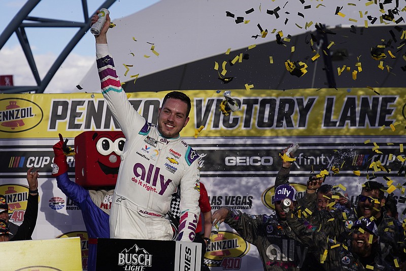 Alex Bowman (48) celebrates after winning a NASCAR Cup Series auto race Sunday, March 6, 2022, in Las Vegas. (AP Photo/John Locher)
