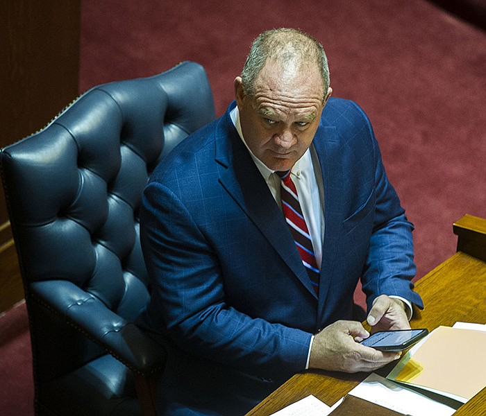 Senator Jimmy Hickey, Jr. checks his phone during a Senate meeting at the Arkansas State Capitol on Monday, March 7, 2022.

(Arkansas Democrat-Gazette/Stephen Swofford)