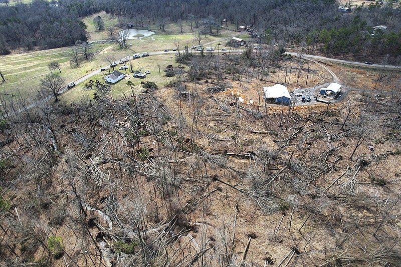 Downed trees can be seen in this aerial photo of damage after a tornado struck near Dover on Monday, March 7, 2022. See more photos at arkansasonline.com/308damage/ (Arkansas Democrat-Gazette/Colin Murphey)