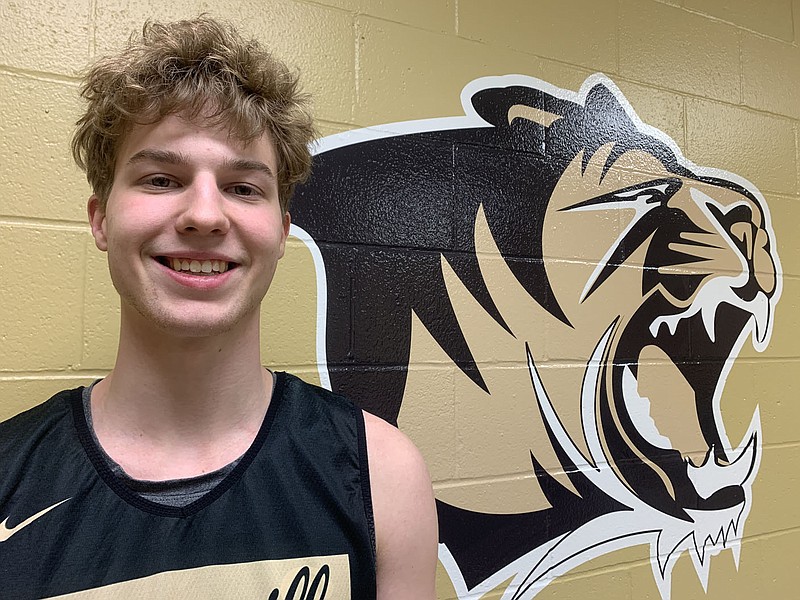 Abel Hutchinson, a senior for the Bentonville Tigers boys basketball team, will lead the team into the Class 6A state championship game today in Hot Springs. Hutchinson is a two-year starter for the Tigers and plays multiple positions on the floor. The Tigers will take on No. 1 North Little Rock at 7:45 p.m. tonight in Bank OZK Arena.
Chip Souza NWA Democrat-Gazette