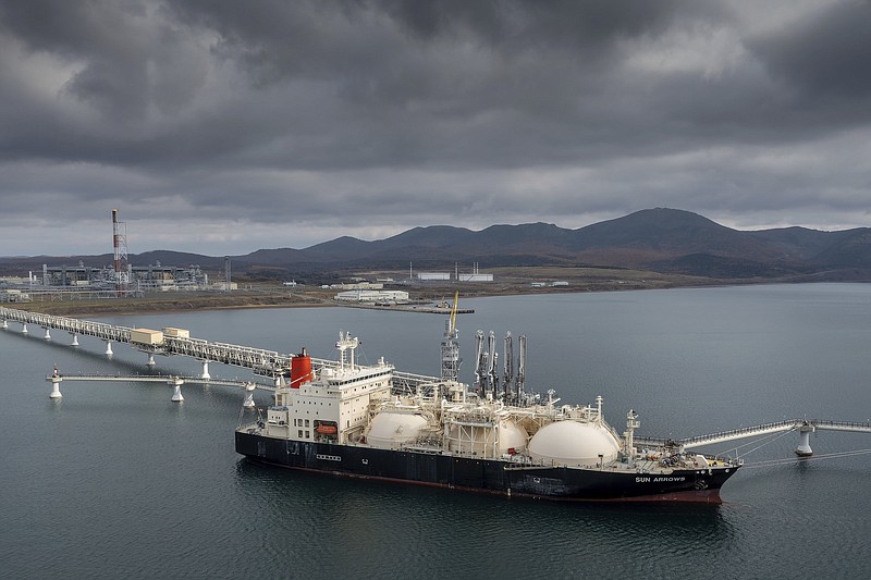 The tanker Sun Arrows loads its cargo of liquefied natural gas from the Sakhalin-2 project in the Pacific Ocean port of Prigorodnoye, Russia, on Friday, Oct. 29, 2021. Sanctions on Russia are starting to wreak havoc on global trade, with potentially devastating consequences for energy and grain importers but also generating inflationary ripple effects across a world still struggling to overcome pandemic-induced supply chain disruptions. (AP Photo/File)