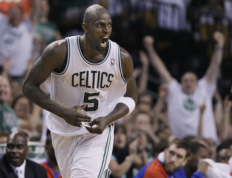 FILE  -Boston Celtics forward Kevin Garnett screams after he scored during the fourth quarter of Game 7 against the Philadelphia 76ers in an NBA basketball Eastern Conference semifinal playoff series, Saturday, May 26, 2012, in Boston. KG is set to add another chapter to his legacy when he becomes the 24th member of the Celtics organization to have his jersey number retired. (AP Photo/Elise Amendola, File)