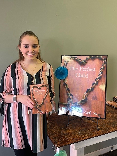 CHS graduate Megan VanLoo self-publishes her first book, "The Perfect Child." (Democrat photo/Kaden Quinn)