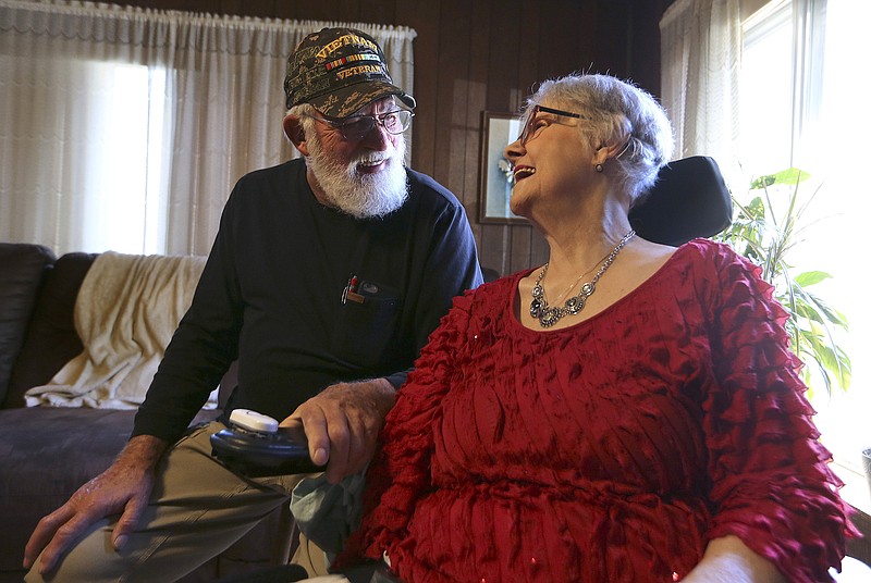 Larry Tyler laughs with his wife, Earlene, at their home on Wednesday, March 9, 2022, in Traskwood. 
(Arkansas Democrat-Gazette/Thomas Metthe)