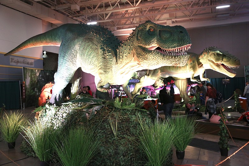 Big animatronic beasts will tower over visitors this weekend as “Dinosaur Adventure” takes over Barton Coliseum at the Arkansas State Fairgrounds in Little Rock. (Special to the Democrat-Gazette)