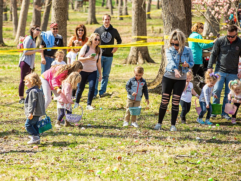 Children frantically search for Easter eggs in 2021 during the annual Jefferson City Jaycees’ Easter Egg Hunt at Memorial Park. (Ken Barnes/News Tribune file photo)