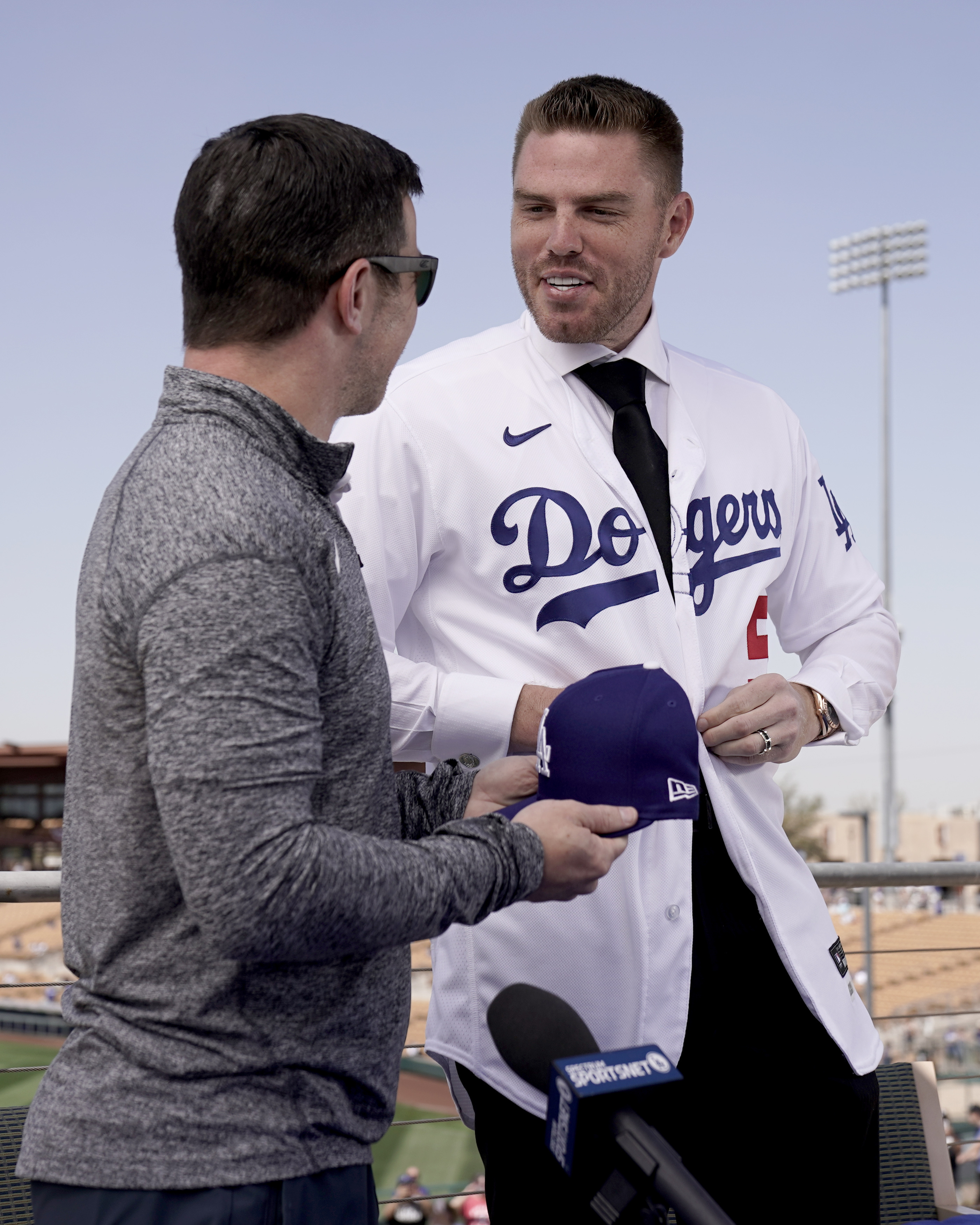 Los Angeles Dodgers first baseman Freddie Freeman (5) and his son, Charlie  Freeman, participate in batting practice before a baseball game against the  Los Angeles Angels in Anaheim, Calif., Wednesday, June 21