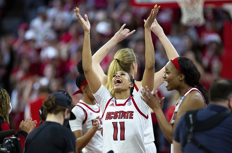 North Carolina State's Jakia Brown-Turner (11) celebrates following a victory over Kansas State in a college basketball game in the second round of the NCAA tournament in Raleigh, N.C., Monday, March 21, 2022. (AP Photo/Ben McKeown)