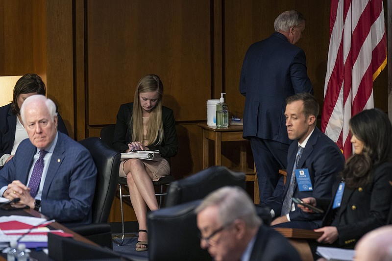 Sen. Lindsey Graham, R-S.C., walks off after questioning Supreme Court nominee Ketanji Brown Jackson during her confirmation hearing before the Senate Judiciary Committee, Tuesday, March 22, 2022, in Washington. (AP Photo/Evan Vucci)