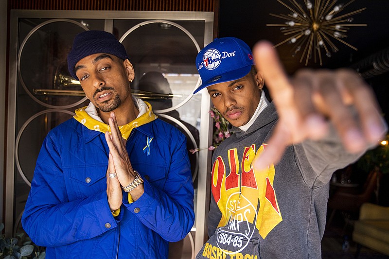 Morgan Cooper, 30, left, director, co-writer and executive producer of the Peacock series &quot;Bel-Air,&quot; and Jabari Banks, 23, of West Philadelphia, Pennsylvania, actor and star of &quot;Bel-Air,&quot; pose for a portrait at the Bayou Jazz Lounge in West Philadelphia on Friday, March 4, 2022. (Tyger Williams/The Philadelphia Inquirer/TNS)