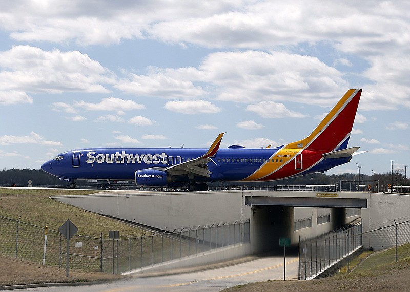 A Southwest Airlines jet taxis to take off at Bill and Hillary Clinton National Airport on Thursday, March 24, 2022, in Little Rock. 
(Arkansas Democrat-Gazette/Thomas Metthe)