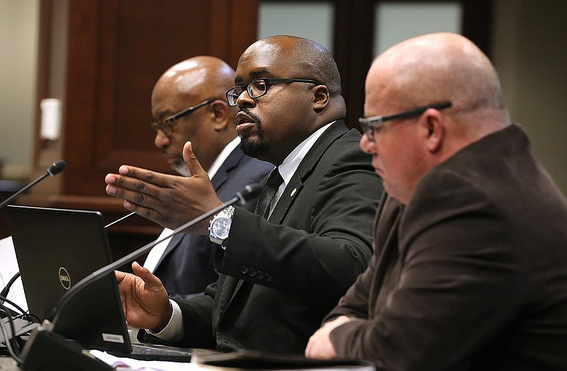 Solomon Graves (center), Department of Corrections Secretary, speaks about prison population and recidivism rates during the joint House and Senate Judiciary Committee meeting on Monday, March 28, 2022, at the state Capitol in Little Rock. 
(Arkansas Democrat-Gazette/Thomas Metthe)