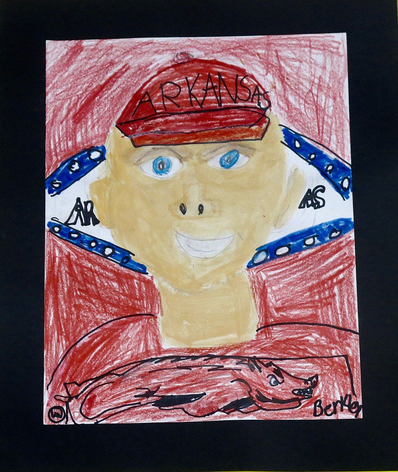 Westside Eagle Observer/SUSAN HOLLAND
Berkley Jarvis reflected his love of the Razorbacks when he painted a Hog fan to be displayed at the Glenn Duffy Elementary art show Tuesday evening, March 8, at the Gravette Civic Center. Berkley, age 8, is a student in Jennifer Davis' classroom. He is the son of Jeris and Becky Jarvis of Hiwasse.