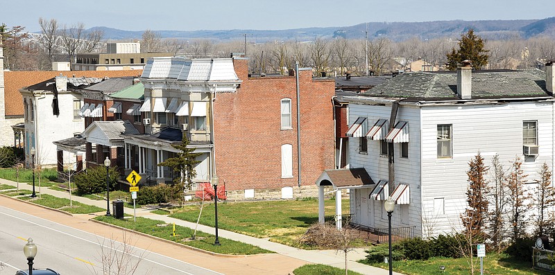 Properties that have been declared dangerous and nuisances by Jefferson City staff, including 407, 409, 413 and 419 East Capitol Avenue, were the subject a city council vote Monday night, April 4, 2022, to authorize supplemental funding for demolition. (Julie Smith/News Tribune photo)