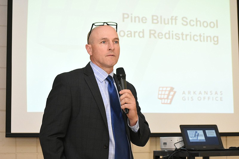 Arkansas geographical information officer Shelby Johnson conducts a presentation of potential Pine Bluff School Board zones during a town hall Tuesday, April 5, 2022, at the Dollarway High School cafeteria. (Pine Bluff Commercial/I.C. Murrell)