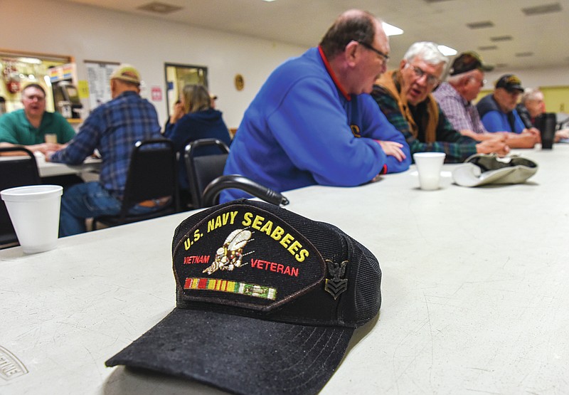 Virgil removed his U.S. Navy Seabees Vietnam Veteran cap he proudly wears Wednesday, April 6, 2022, during a gathering at the DAV on Monticello Road. Veterans can gather for a free breakfast and is an opportunity to talk about issues that may be troubling them, reach out for support or just go be around people with similar experiences. The group meets each Wednesday from 9 to 10 a.m. at the DAV on Monticello Road, just south of Jefferson City. (Julie Smith/News Tribune photo)