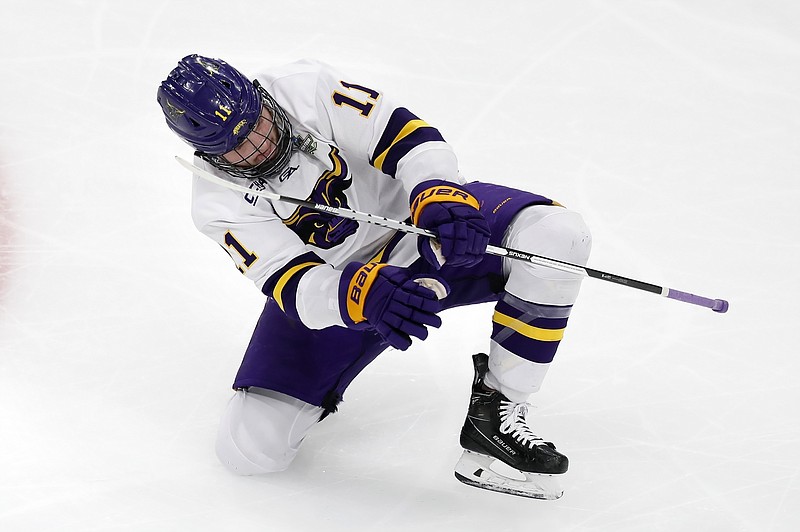 Minnesota State's Benton Maass celebrates after scoring during the second period of the team's NCAA men's Frozen Four hockey semifinal against Minnesota, Thursday, April 7, 2022, in Boston. (AP Photo/Michael Dwyer)