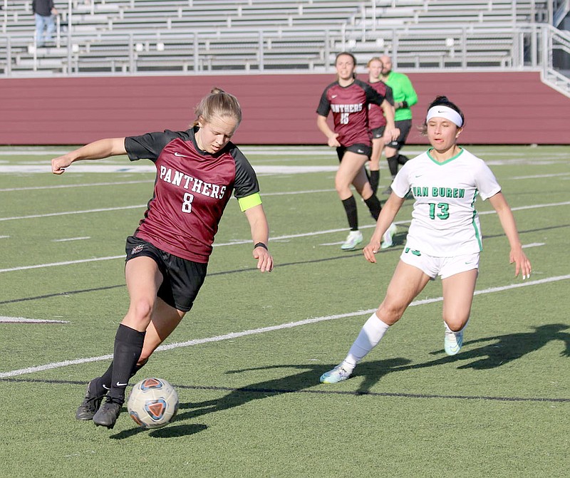 Mark Ross/Special to Siloam Sunday
Siloam Springs senior Bethany Markovich dribbles through the Van Buren defense during Tuesday's match at Siloam Springs. The Lady Panthers defeated Van Buren 8-0.