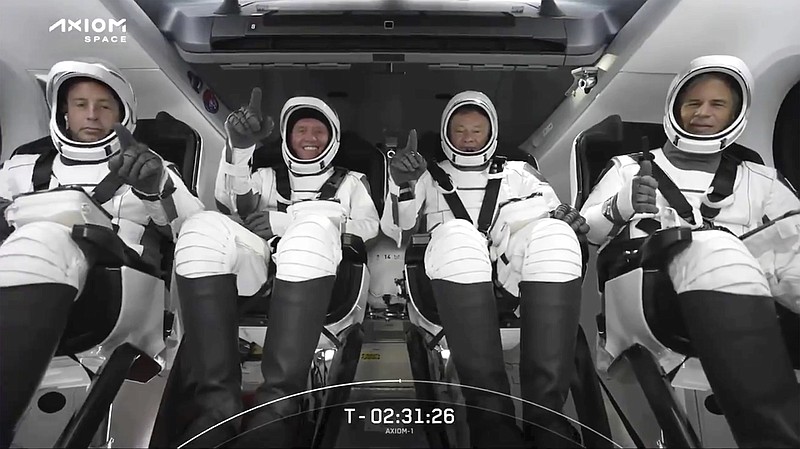 This photo provided by SpaceX shows the SpaceX crew seated in the Dragon spacecraft on Friday, April 8, 2022 in Cape Canaveral, Fla.  SpaceX is scheduled to launch  three rich businessmen and their astronaut escort to the International Space Station for more than a week&#x2019;s stay.  (SpaceX via AP)