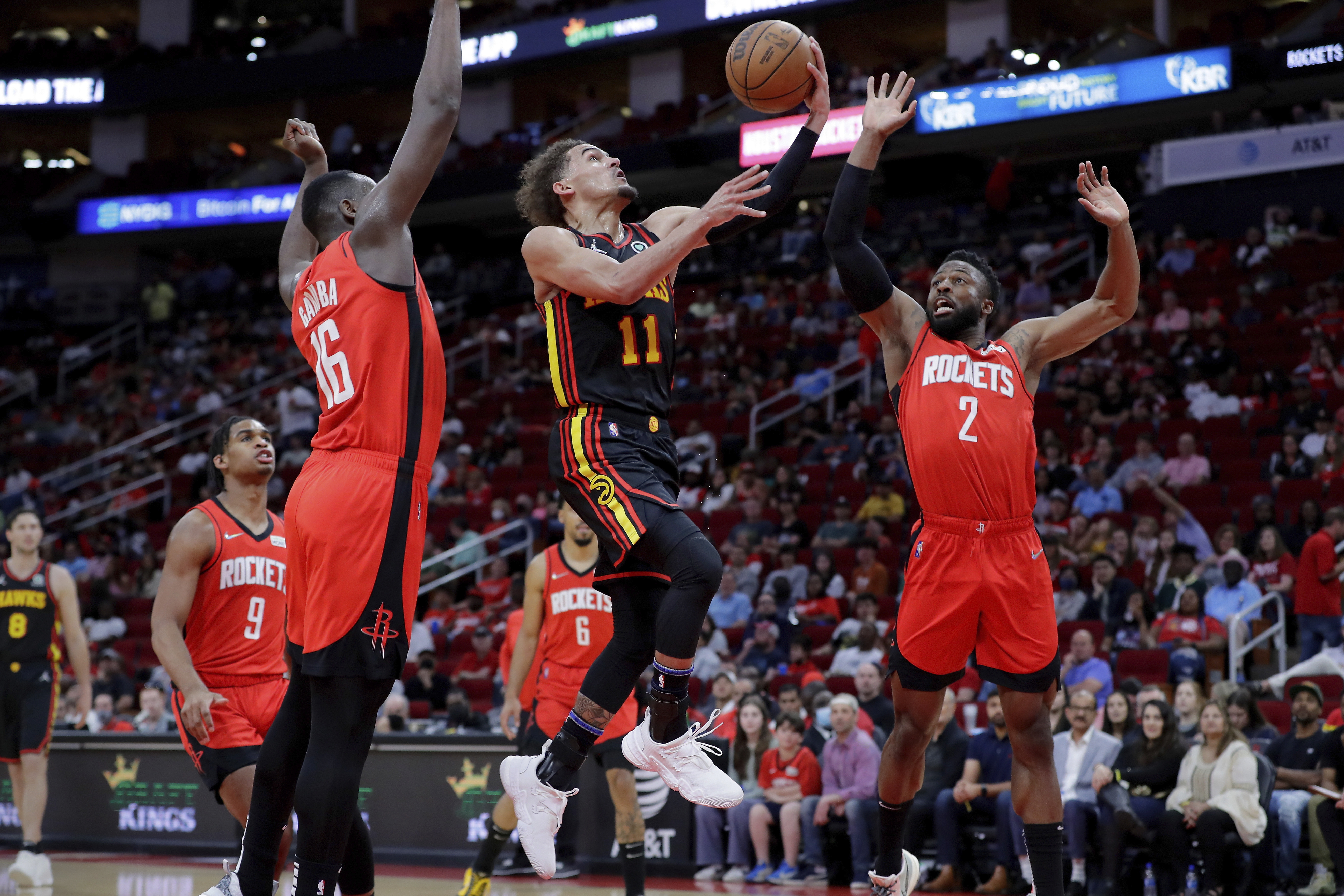 Hawks beat Rockets, 130-114, but stay in ninth spot for play-in