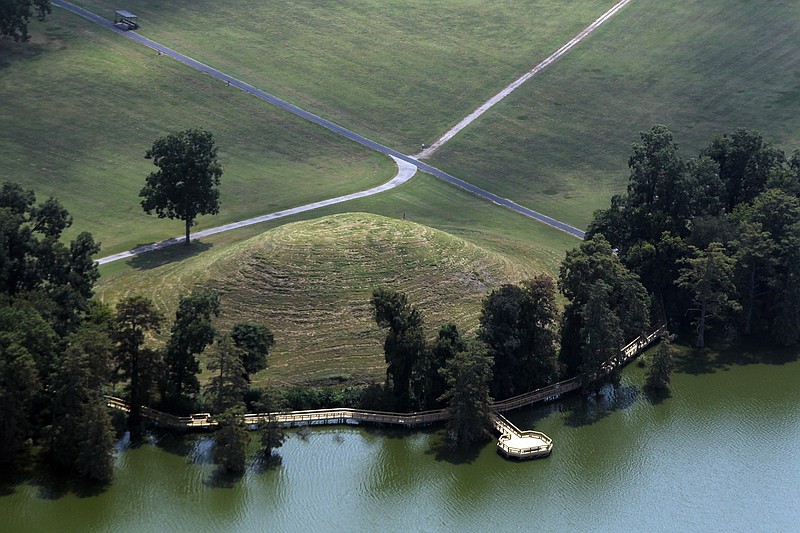 The rounded mound, believed to be a burial site, is seen in an aerial photo taken in 2013. (Democrat-Gazette file photo)