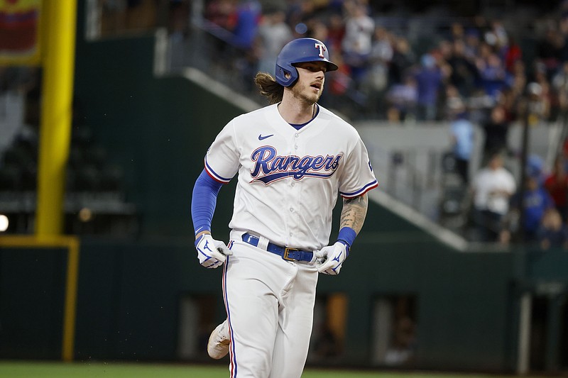 Rangers back Gray with 3 straight homers, beat Angels 5-1 to