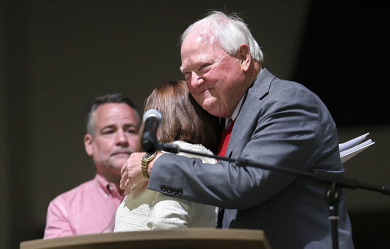 Dr. Jim D. Rollins hugs Principal Annette Thompson, Friday, April 15, 2022 at the Rollins School of Innovation in Springdale. Staff and school administrators held a school dedication ceremony for Dr. Jim D. Rollins. Construction of the Rollins School of Innovation began in October 2020 and continued through February 2022. It is the eighteenth elementary school for Springdale Schools with a current enrollment of 335 students in kindergarten through fifth grade. The school has the capacity to serve 700 students. Check out nwaonline.com/220416Daily/ and nwadg.com/photos for a photo gallery.

(NWA Democrat-Gazette/Charlie Kaijo)