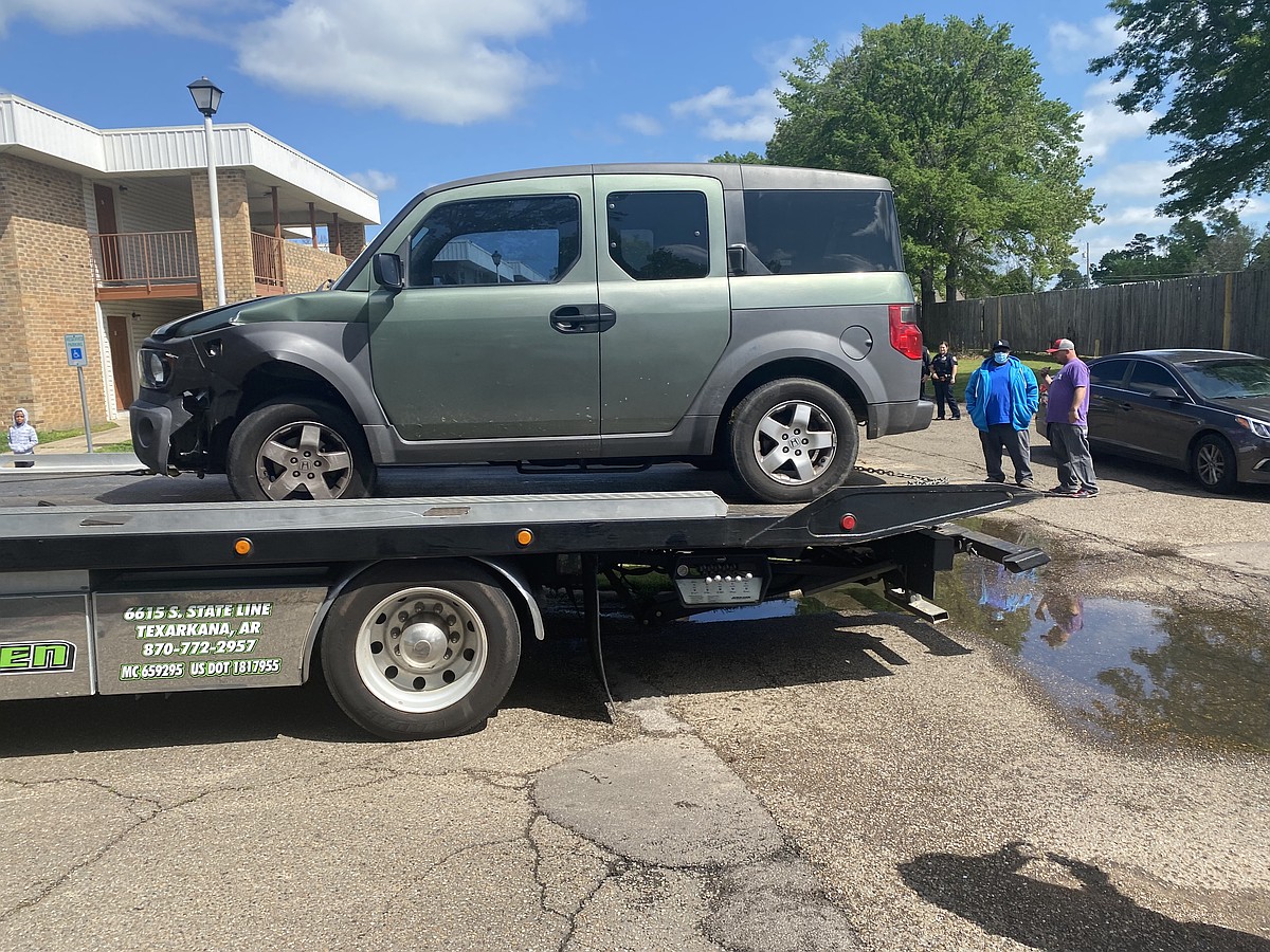Woman arrested after allegedly ramming vehicle with her baby inside ...