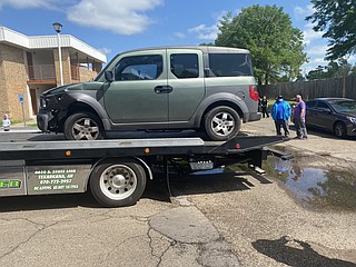 Woman arrested after allegedly ramming vehicle with her baby inside ...