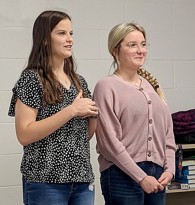 Westside Eagle Observer/RANDY MOLL
Gentry sophomores Reese Hester (left) and Payge Deason address the school board on Monday night, March 18, requesting that permission be granted for next year's prom to be held off-campus at the Holland Barn in Highfill. The school board voted unanimously to grant the request.