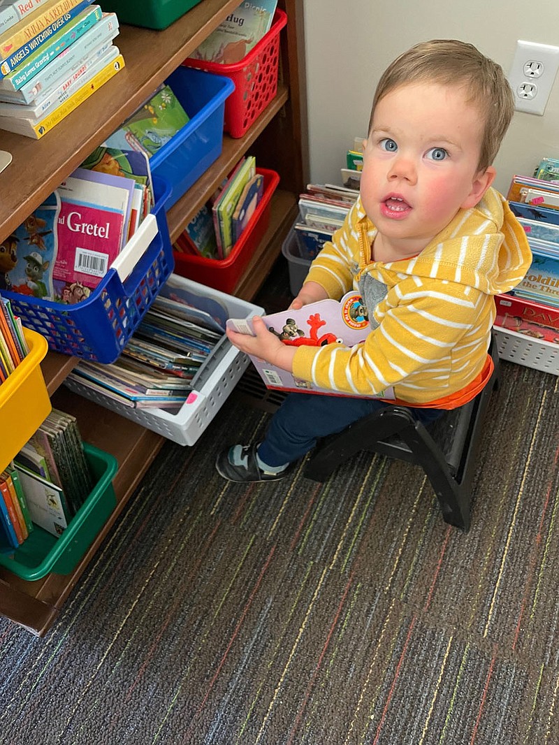Photo submitted
Thomas Raith loves the books for toddlers section of the Bookstore at the Library.