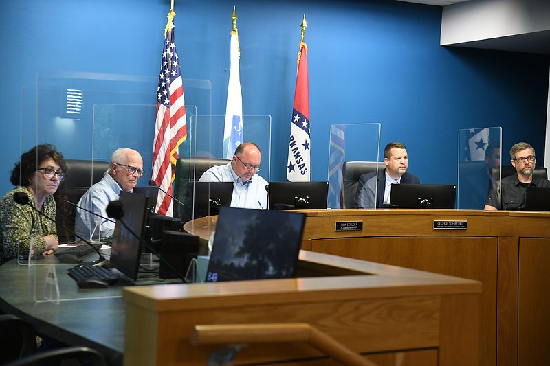 The Historic District Commission listens as Bob Graham speaks Thursday about the proposed mural at 110 Central Ave. The commission approved the mural. - Photo by Tanner Newton of The Sentinel-Record