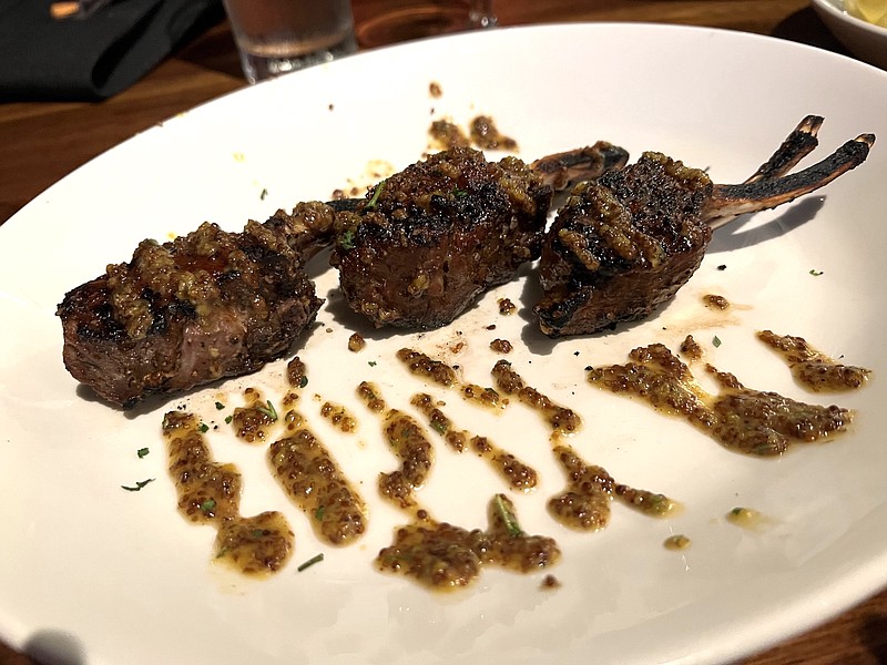 There was considerably more meat than we first thought on the six bones of Sullivan's Steakhouse's Rack of Lamb. (Arkansas Democrat-Gazette/Eric E. Harrison)