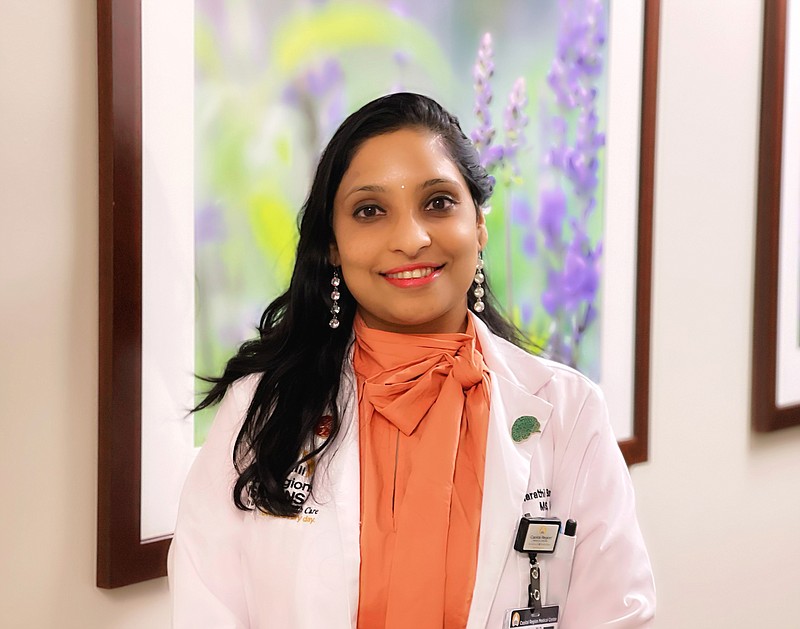 Harathi Bandaru, a neurologist at Capital Region Medical Center, discusses diagnoses and treatments for Alzheimer's disease patients.
Photo by Joe Gamm