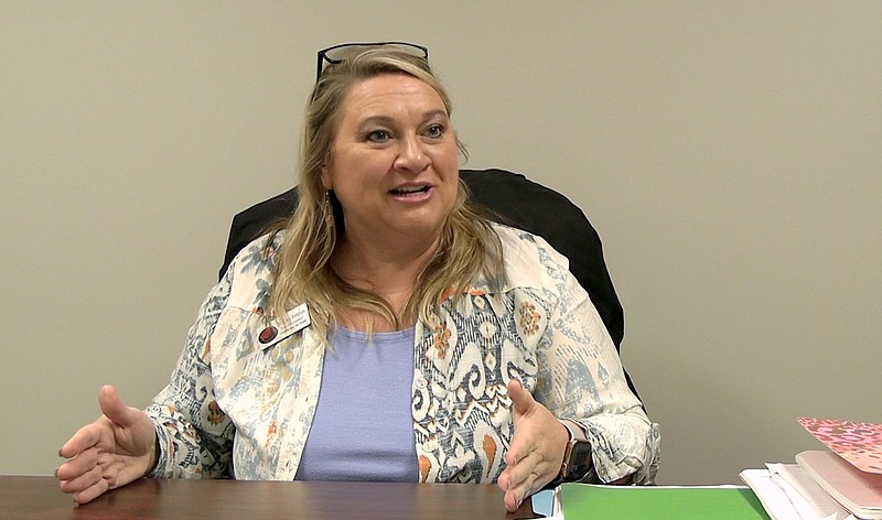 Cutter Morning Star School Superintendent Nancy Anderson talks about the district’s decision this week to move to a four-day school week starting this fall, while in her office on Friday. - Photo by Andrew Mobley of The Sentinel-Record