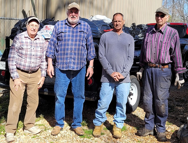 Photo submitted The Bella Vista Fly Tyers Club's aluminum can recycling crew takes a break after loading a trailer of aluminum cans to take to the recycling center in Rogers on Tuesday, April 19. This trip brought in $308 which the club will use for donations to area philanthropic projects. Pictured (from left) are Paul Bickford, Bill Ginger, Ken Wayne and Al Haase.